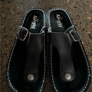 Alegria Black Leather Buckle Toe-Post Slides